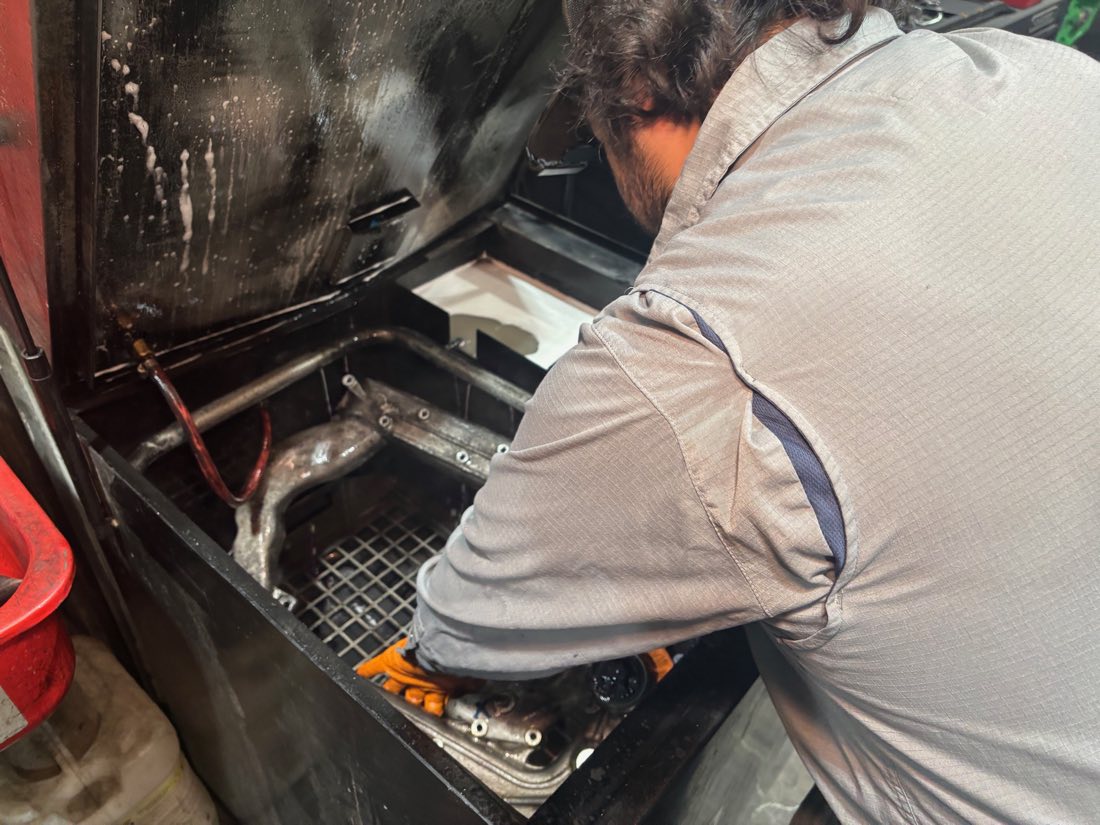 McDiesel tech working on a diesel engine for a Reno customer
